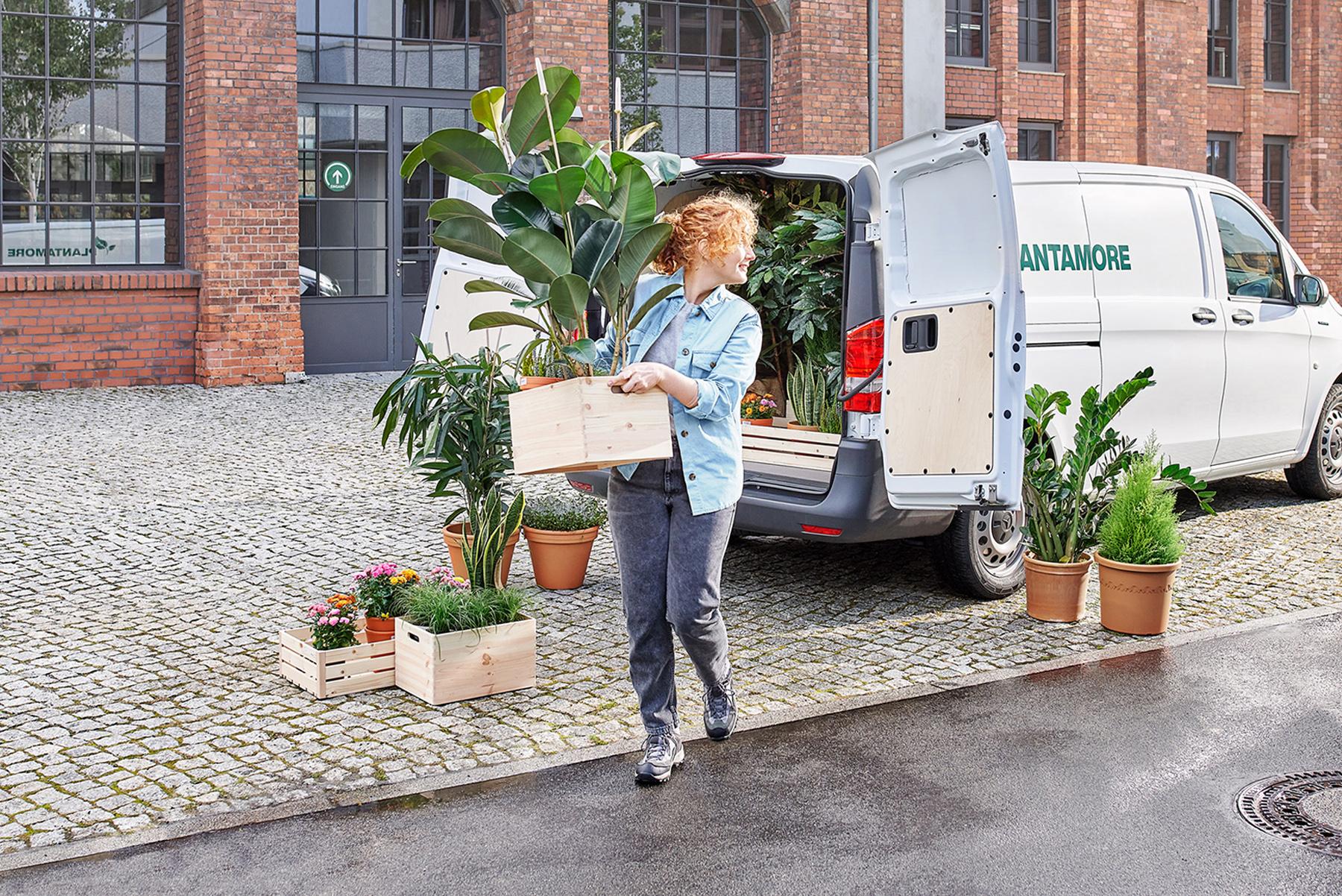woman_unloading_plants